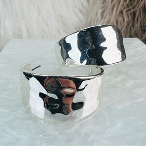 Robert Lee Morris wide weighted hammered half hoop Silvertone pierced earrings